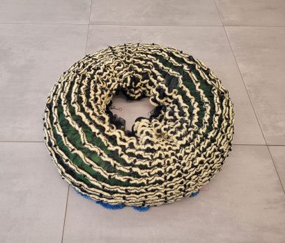 Karin van Dam, Polyp, 2024, edition of 2, monofilament, wool, plastic, 25 x 80 x 80 cm